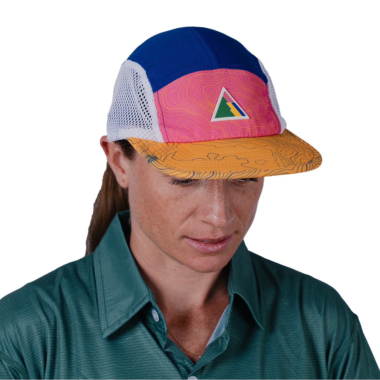Person wearing a colorful cap with a triangle logo on a white background