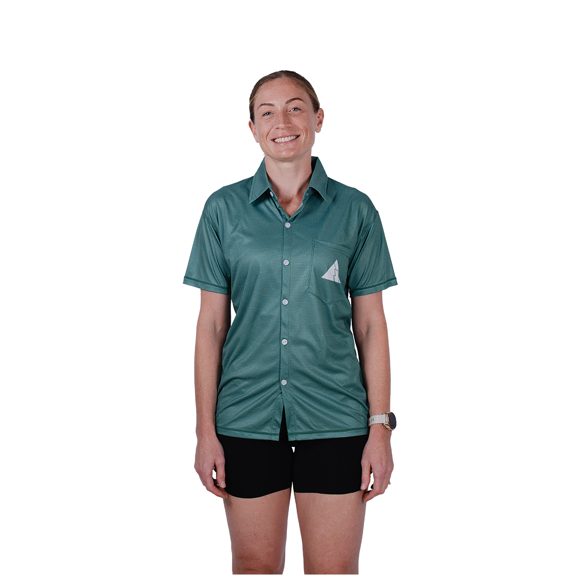 Person wearing a green shirt with a logo on a white background